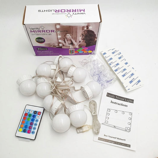 Kit de foquitos LED para espejo con su caja, control remoto, adhesivos e instrucciones
